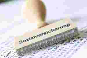 Holzstempel Sozialversicherung